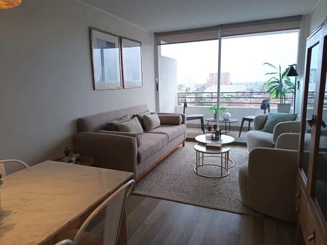 Living comedor vista balcon venta departamento San Bernardo bono pie entrega inmediata