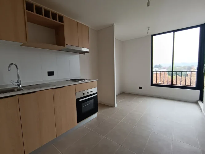 Living comedor ventanal Departamento 2 dormitorio 2 baños 65 m2 venta con bono pie 20% San Joaquin metro Bio-Bio
