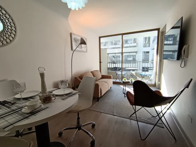 Living comedor vsita balcon departamneto Santiago Centro bono pie