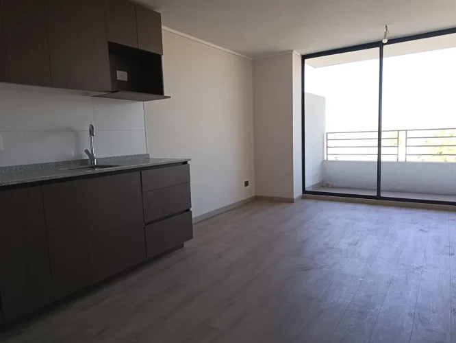 Living comedor vista balcon departamento en venta en Ñuñoa con bono pie entrega inmediata