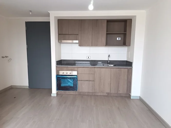 Cocina amoblada vista desde balcon venta con bono 15% pie Macul planta 2d2b
