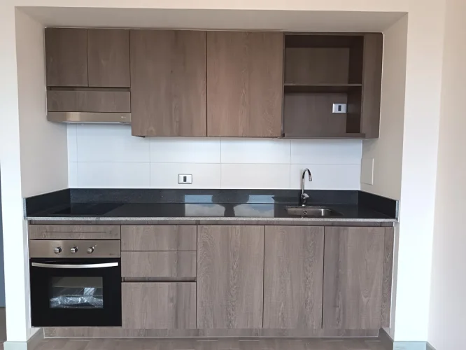 Cocina amoblada Departamento, 2D1B, 44 M2 entrega inmediata y bono pie quince por ciento