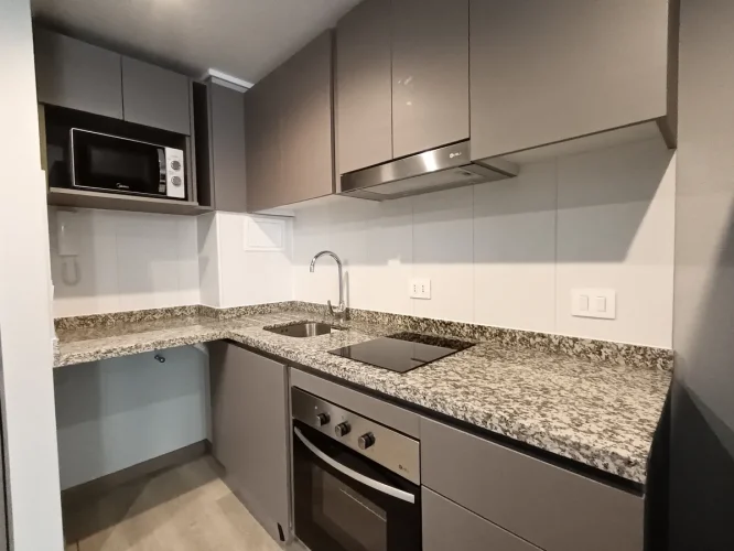 Cocina amoblada venta departamento Santiago Centro Bono pie y tasa rebajada