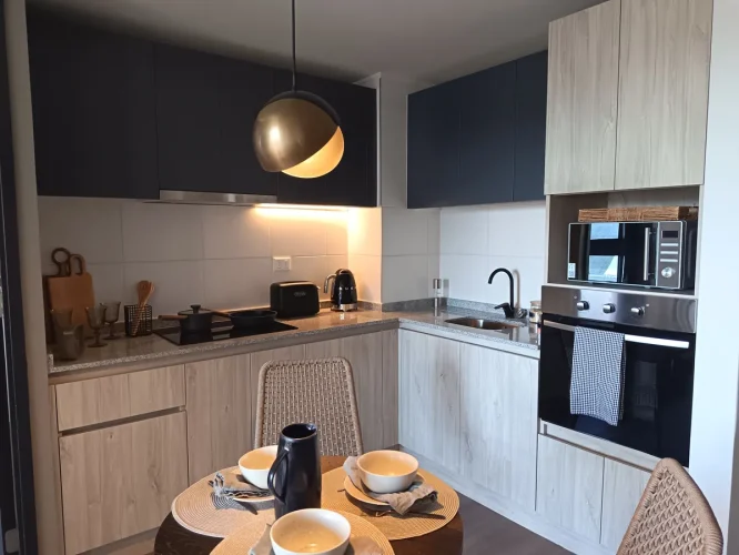Cocina amoblada departamento venta con bono pie Ñuñoa
