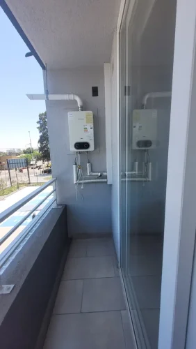 Balcon con poso de ceramica Departamento en Concepción con bono