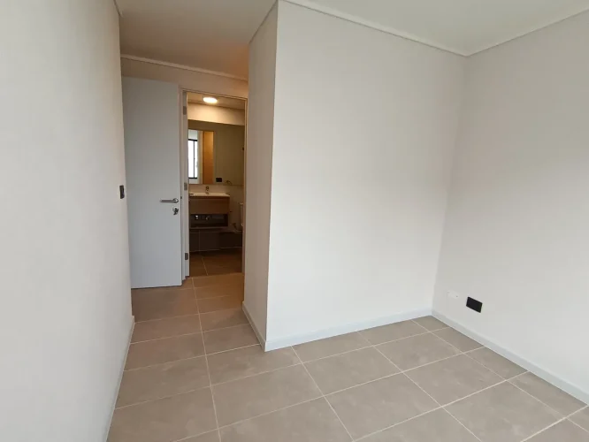 Entada segundo dormitorio departamento cocina costado venta con bono pie San Joaquin