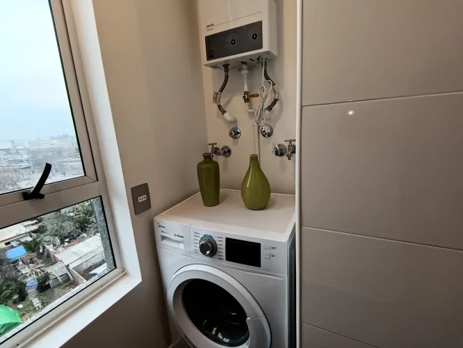 Espacio para conexion lavadora y calefont departamento San Bernardo bono pie entrega inmediata