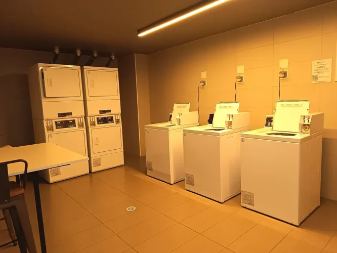 Sala de labado y secado venta departamento con bono pie entrega inmediata metro Los Heroes